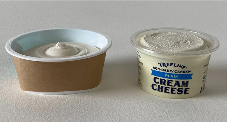 picture of Treeline cream cheese cup compared to a competitor's half empty cup