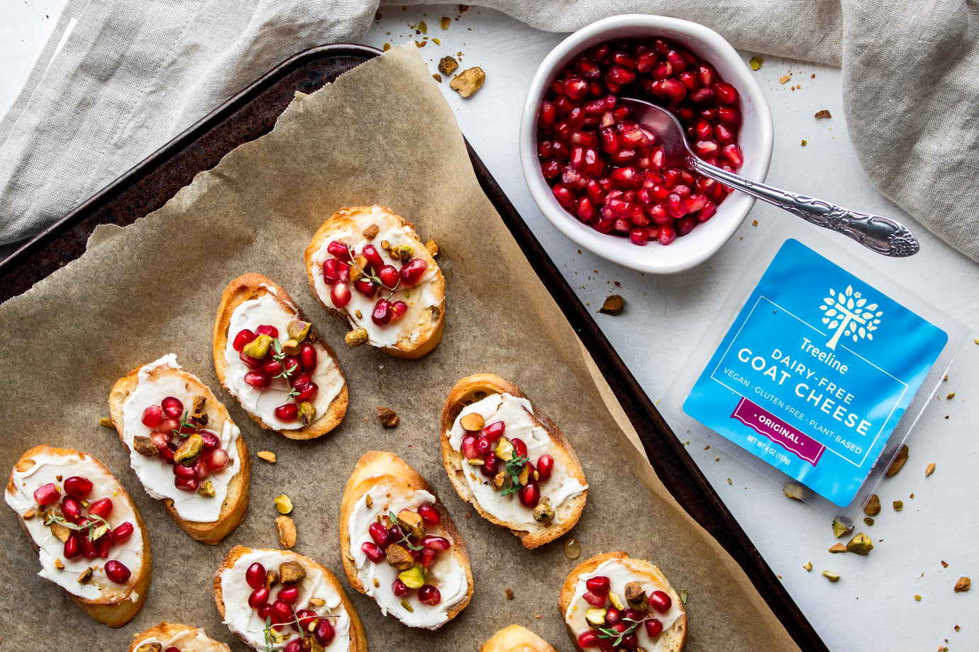 Pomegranate Pistachio Crostini with Goat Cheese