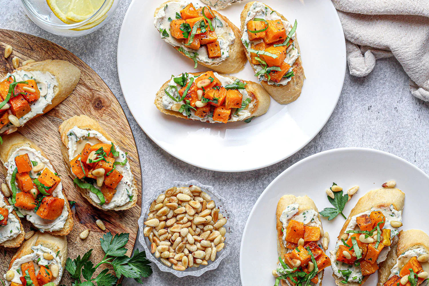 vegan goat cheese on toasts on plates