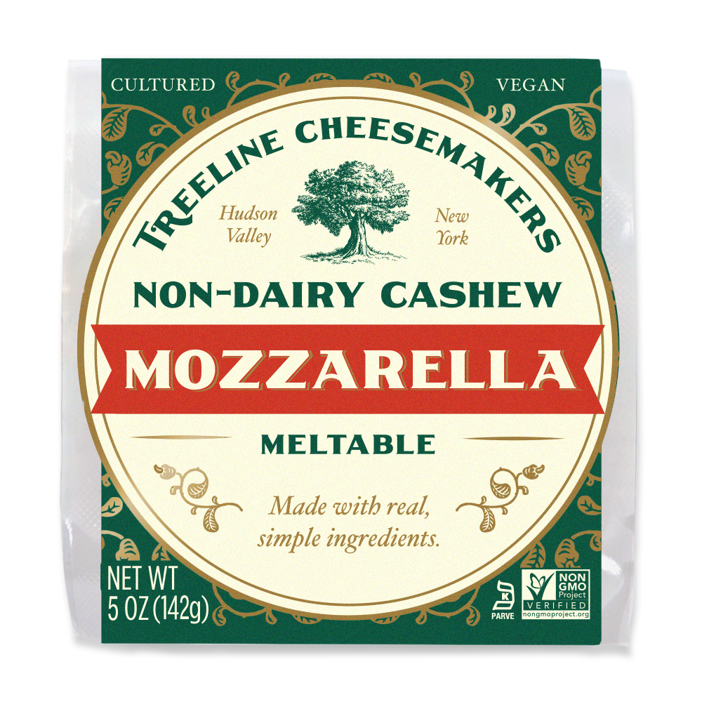 a green and cream package of Treeline Non-Dairy Cashew Mozzarella Block