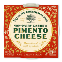 Treeline Non-Dairy Cashew Pimento Cheese in its red and gold packaging