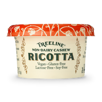 Treeline Non-Dairy Cashew Ricotta cheese in its red, green, and cream packaging