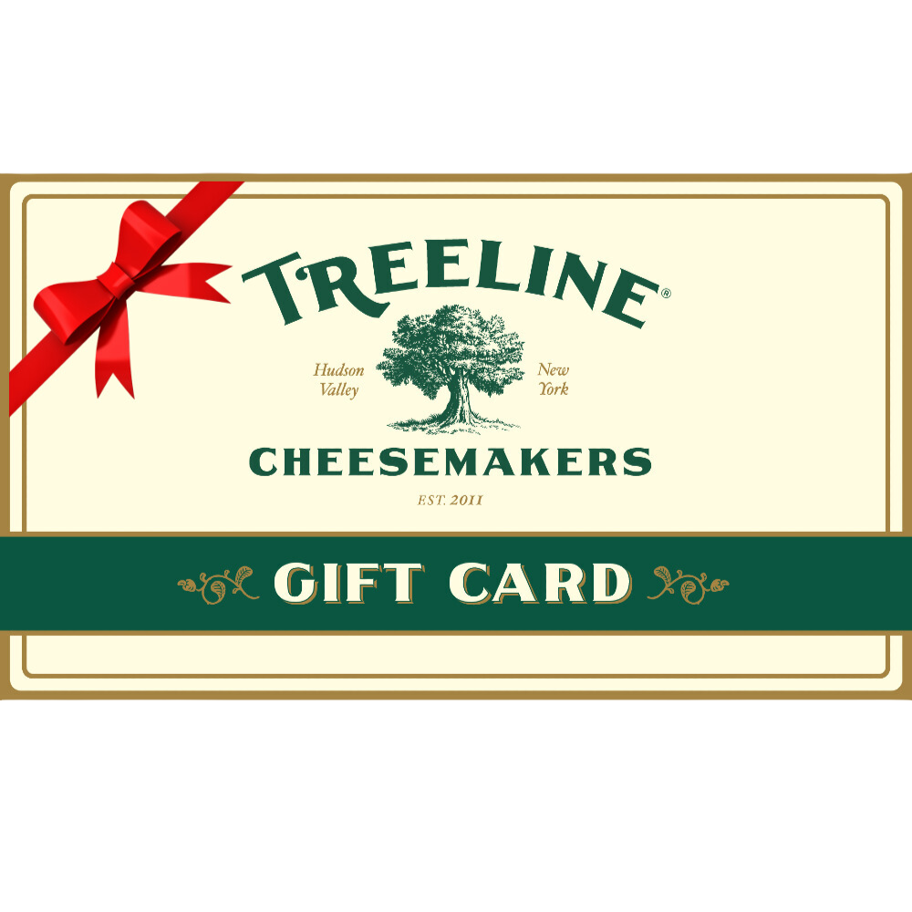 image of gift card with Treeline logo on it and a red bow