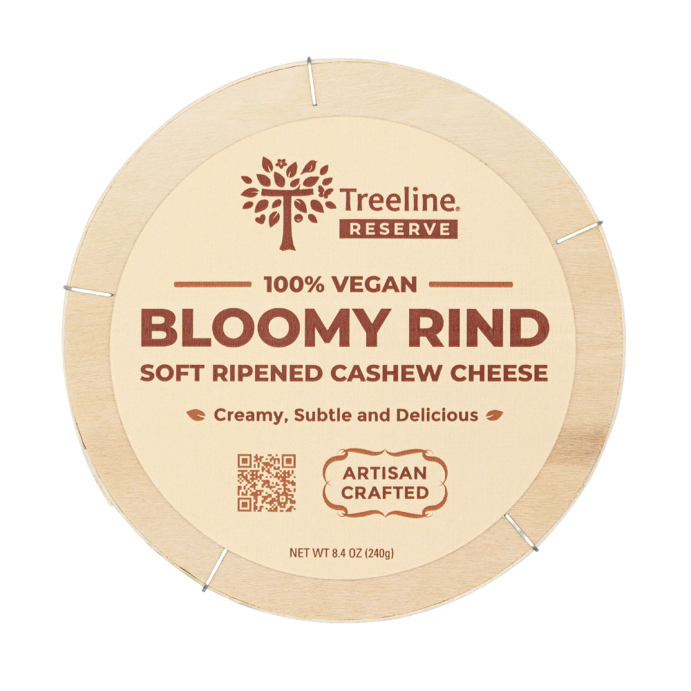 Treeline Vegan Bloomy Rind Soft Ripened Cashew Cheese - packed in a circular wooden box