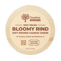 Treeline Vegan Bloomy Rind Soft Ripened Cashew Cheese - packed in a circular wooden box